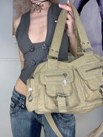 medium sized duffle bag in track material crossbody