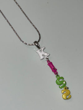 multicoloured " kiss " hanging necklace with small diamonds