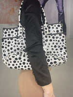 dotted shoulder bag in shiny material